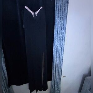 This is a all plain black dress with a slit on the side